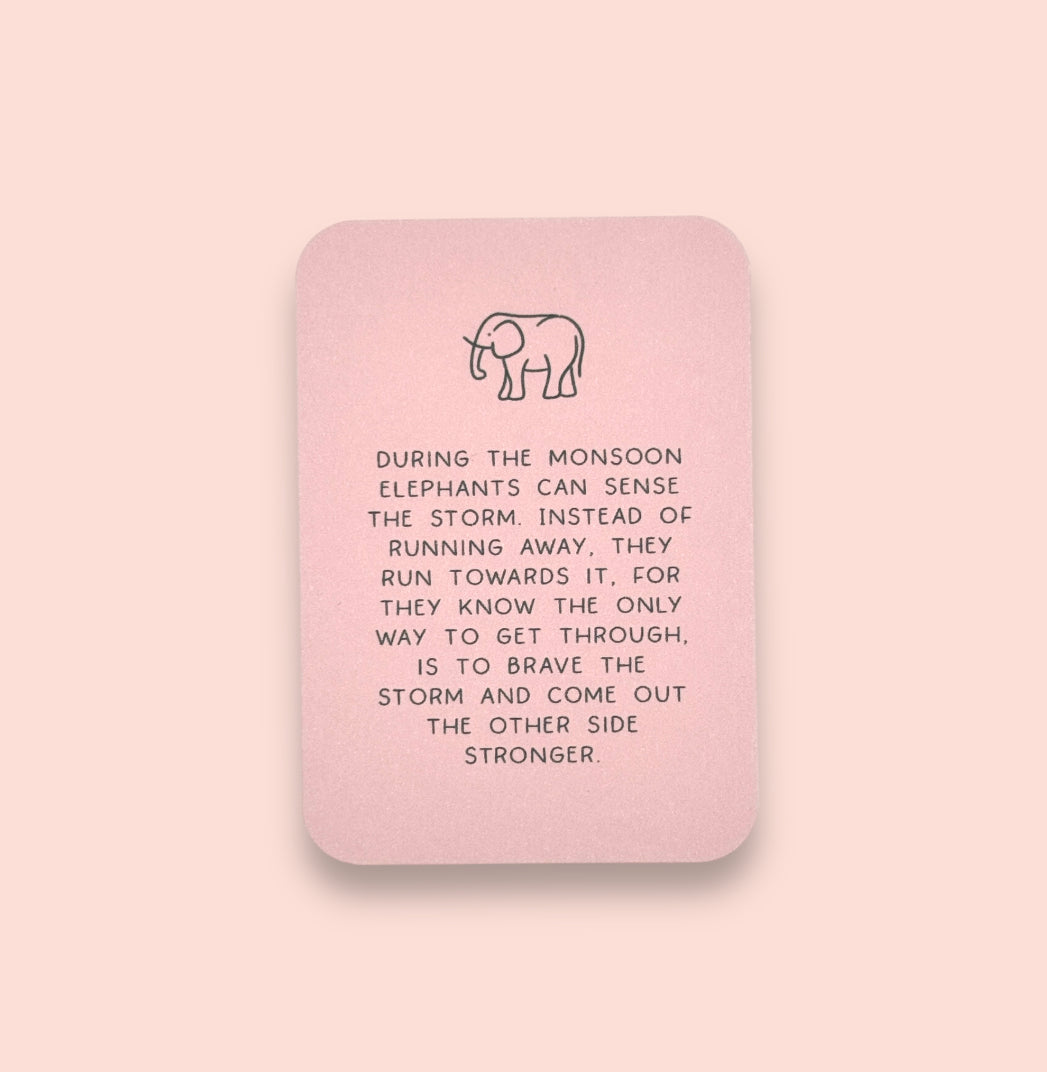 White & grey marble elephant charm bracelet with inspirational bravery/ strength/ courage quote card